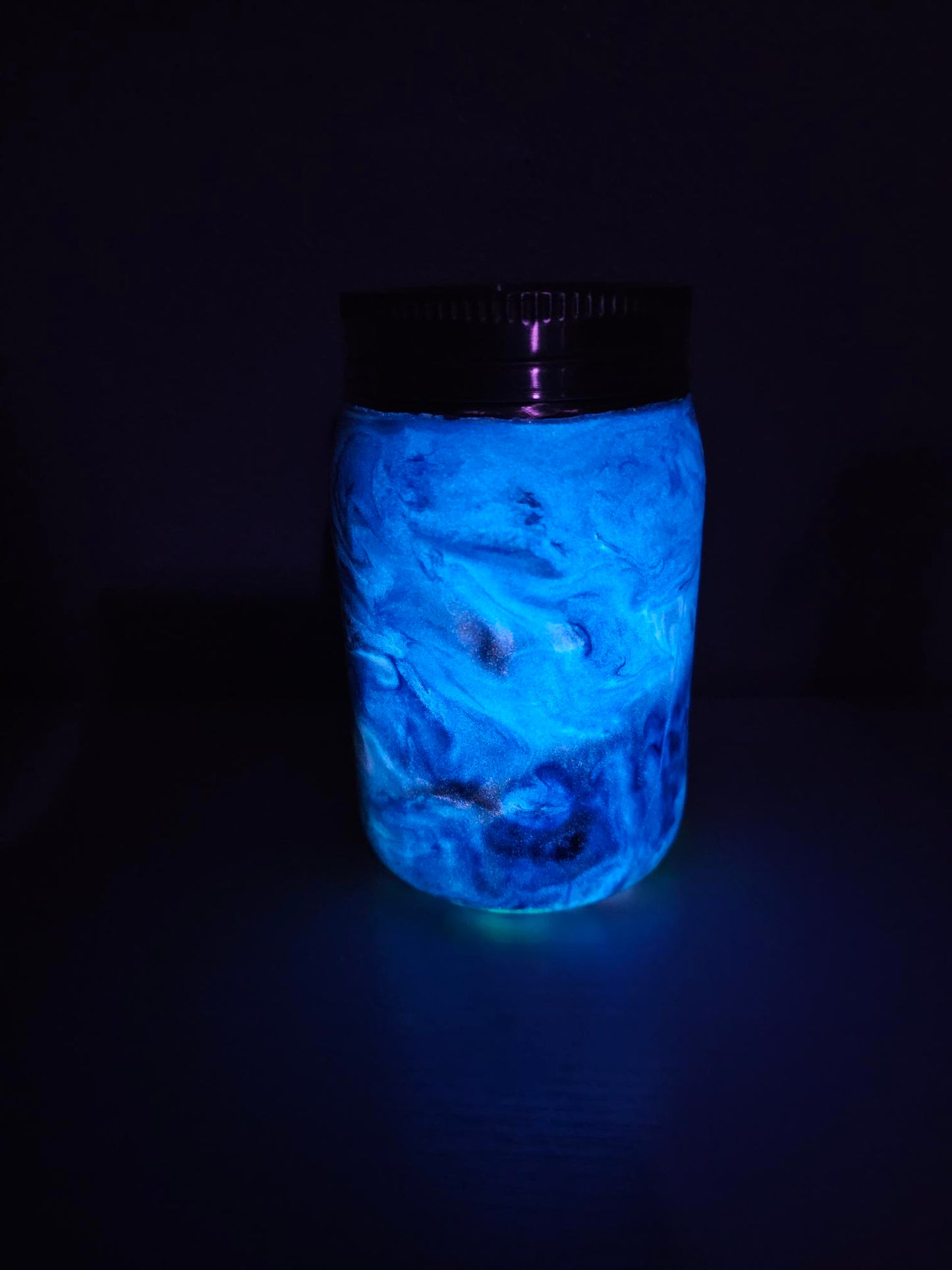 #45 12oz Blue and white swirls Mason Jar with a blue glow